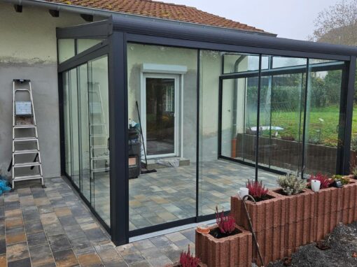 Terrassenüberdachung Alu mit Glasdach mit Seiten-Schiebe-Elementen in Schönenberg-Kübelberg OT Sand